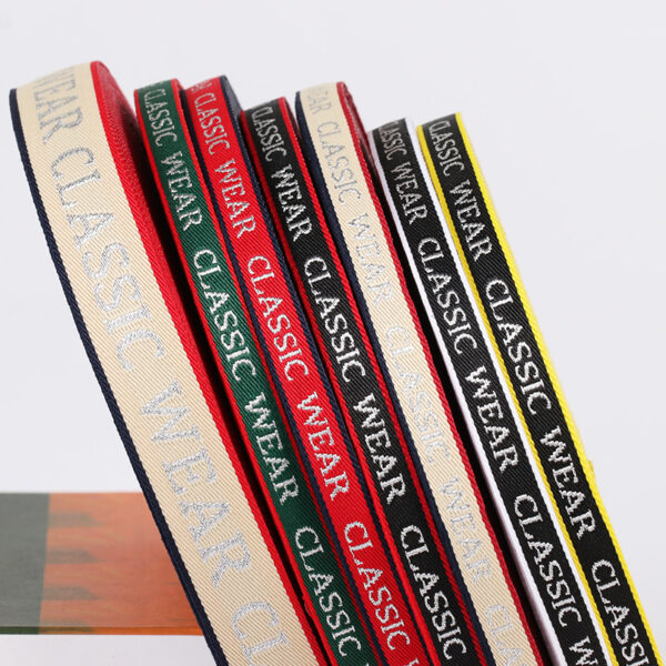 1cm–2cm Silver Thread Letter Jacquard Webbing – Polyester “Classic Wear” Trim Tape for Garment Decoration