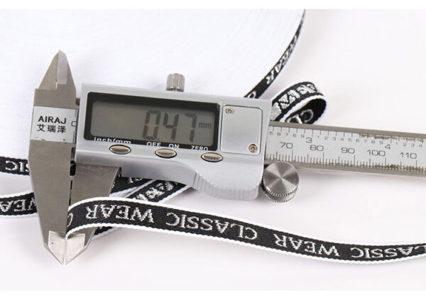 1cm–2cm Silver Thread Letter Jacquard Webbing – Polyester “Classic Wear” Trim Tape for Garment Decoration