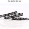 1cm–2cm Silver Thread Letter Jacquard Webbing – Polyester “Classic Wear” Trim Tape for Garment Decoration